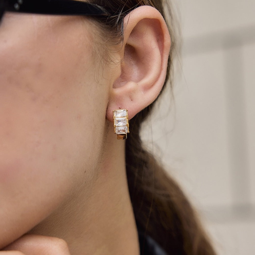 Polished hoop earrings with clear accents