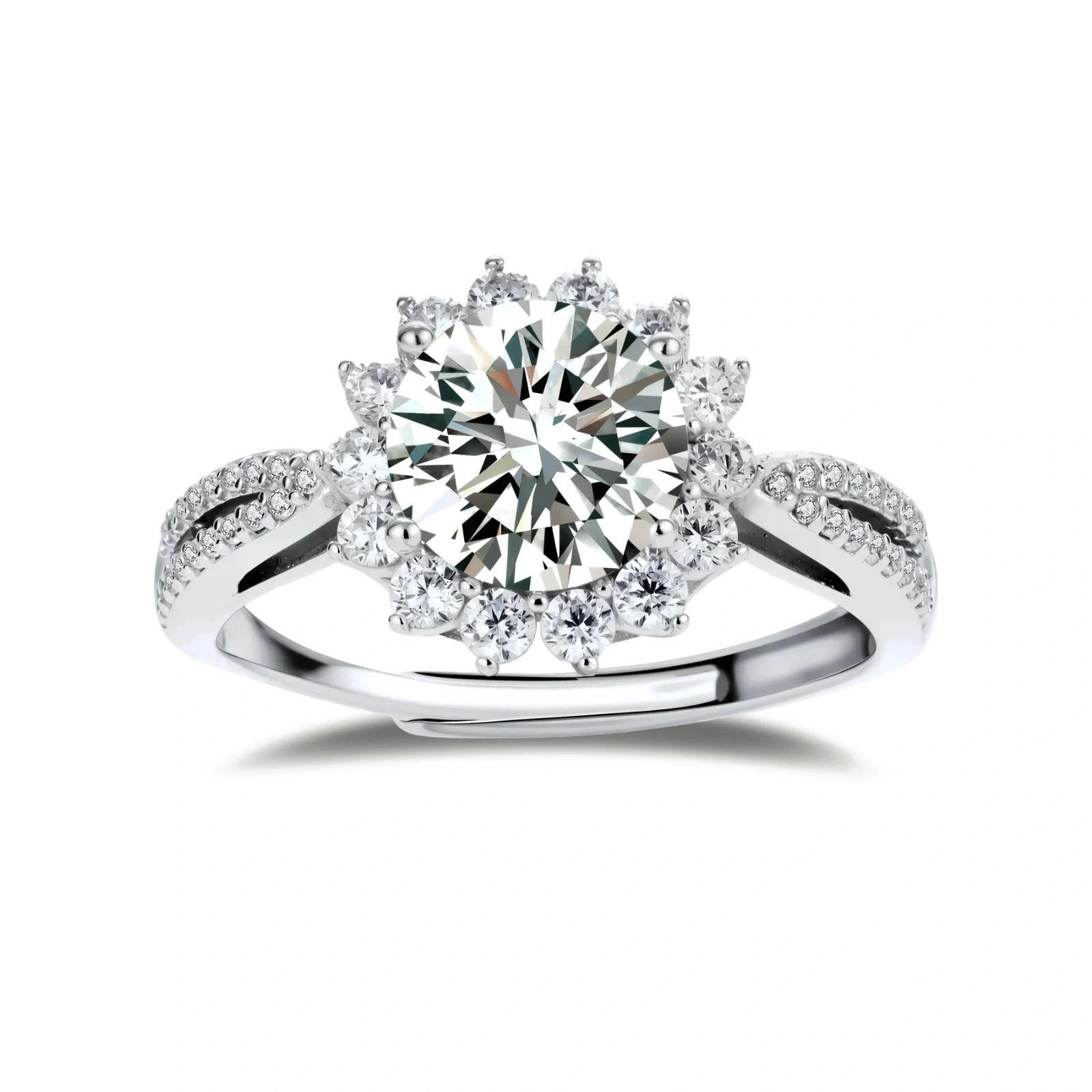 Close-up of sterling silver halo ring with brilliant round moissanite center stone surrounded by smaller accent stones