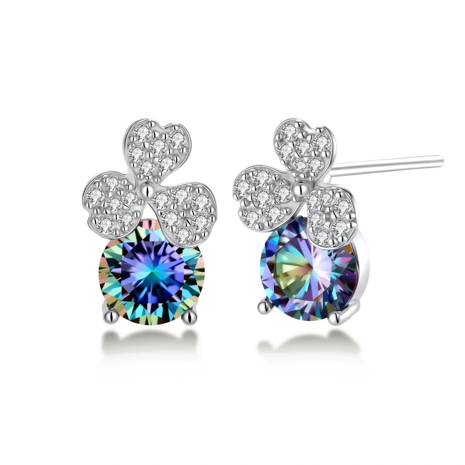Sterling silver jewelry set with rainbow moissanite stones in clover and butterfly designs on cream background