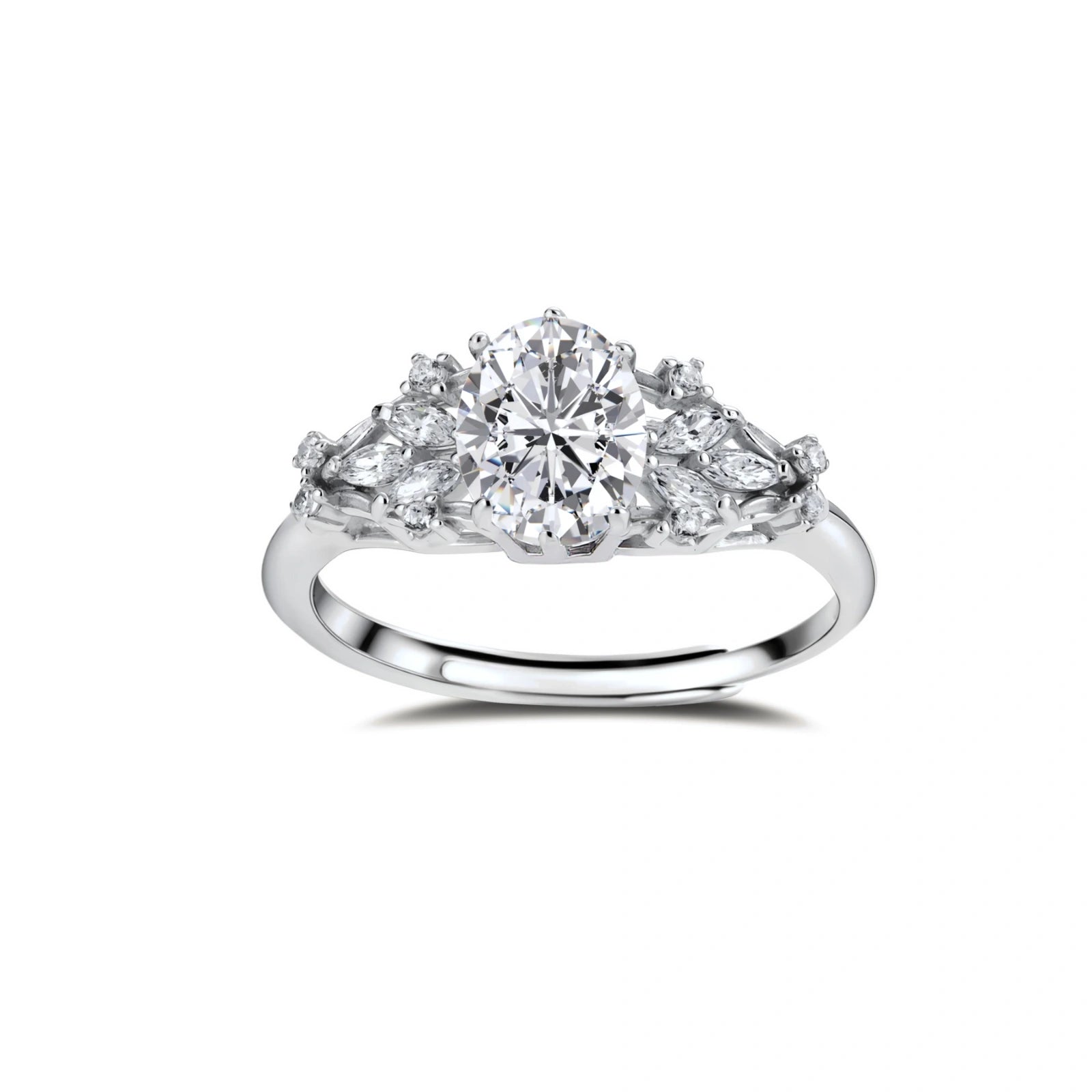 Sterling silver ring with oval moissanite center stone surrounded by smaller accent stones in ornate setting