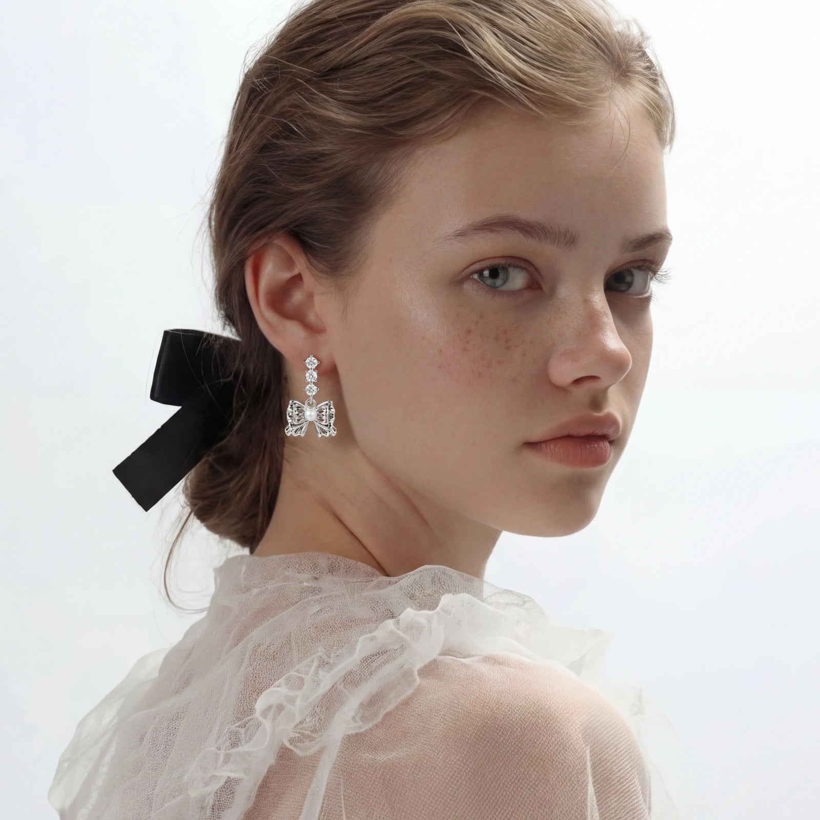 Pearl Bow Zirconia Drop Earrings