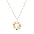 Gold pendant necklace with circular orbital design, iridescent mother-of-pearl center, and green zirconia accents