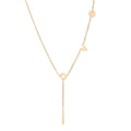 Gold Y-shaped necklace with L-O-V-E letter charms and vertical bar pendant on delicate chain against cream background