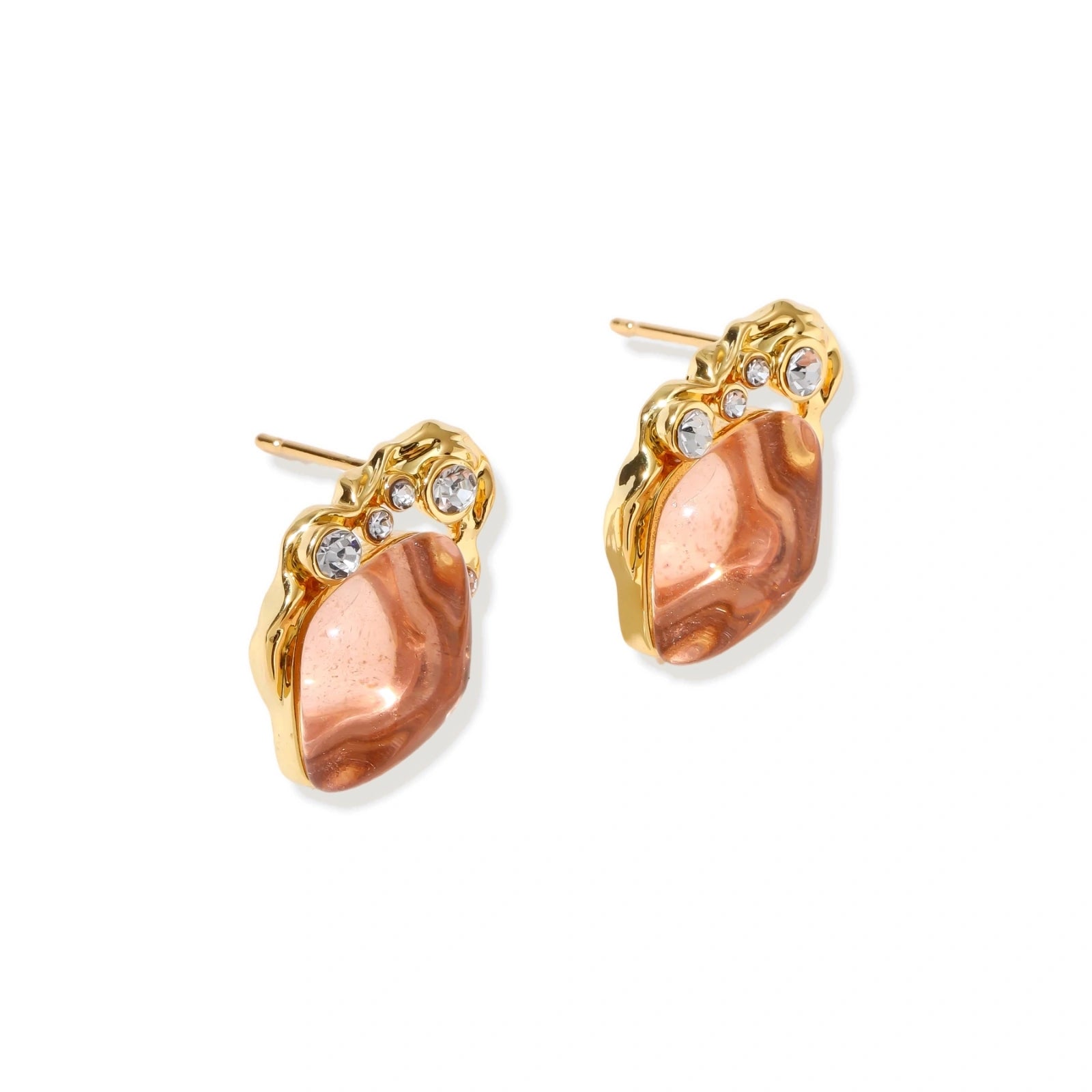 Gold-plated baroque stud earrings with coral-pink liuli stones and cubic zirconia crystals on white background.