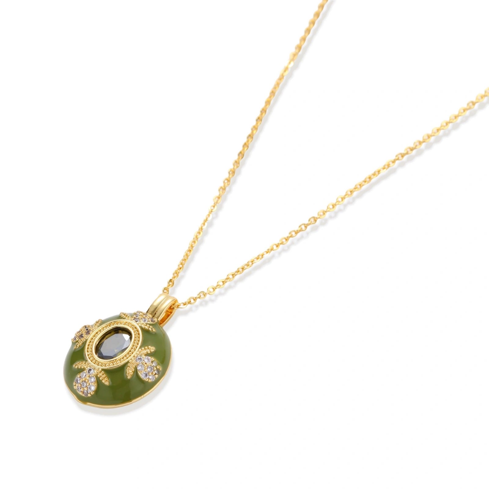 Gold-tone pendant with olive-toned center stone