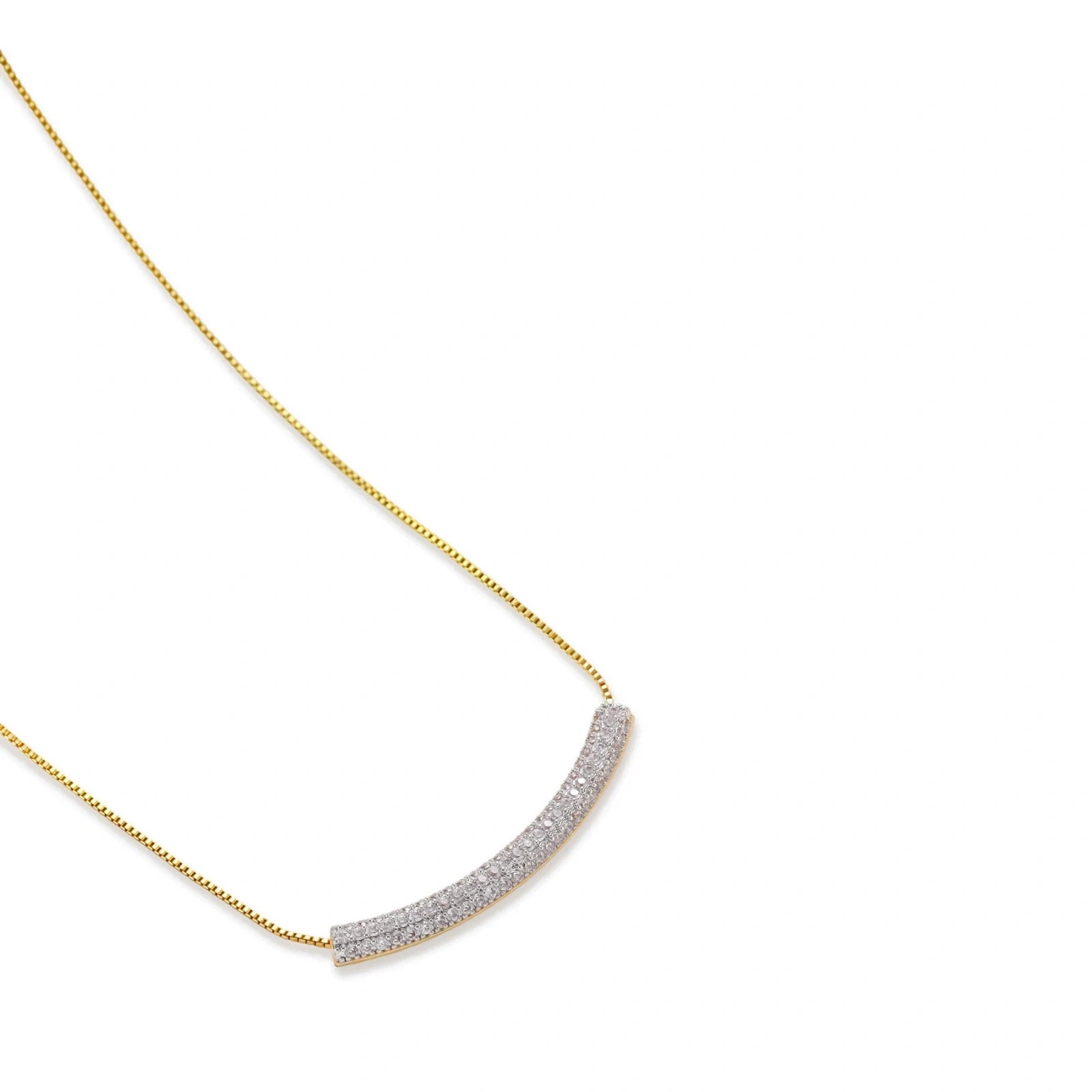 Gold-plated curved necklace, hoop earrings, and adjustable ring with pavé cubic zirconia stones on cream background.