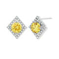 Close-up of diamond-shaped stud earrings with yellow moissanite centers and clear stone halos in sterling silver setting