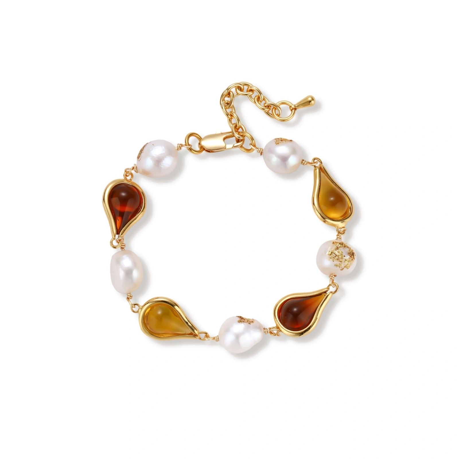Elegant bracelet with alternating baroque pearls and amber teardrop gemstones set in 18k gold-plated copper on cream background.