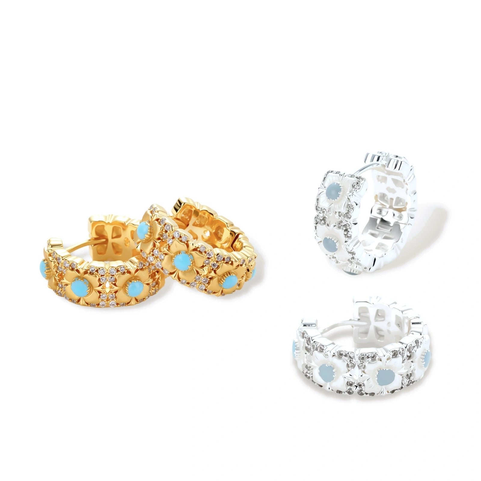 Silver-plated hoop earrings featuring delicate daisy flowers with powder blue centers and crystal accents on white background.