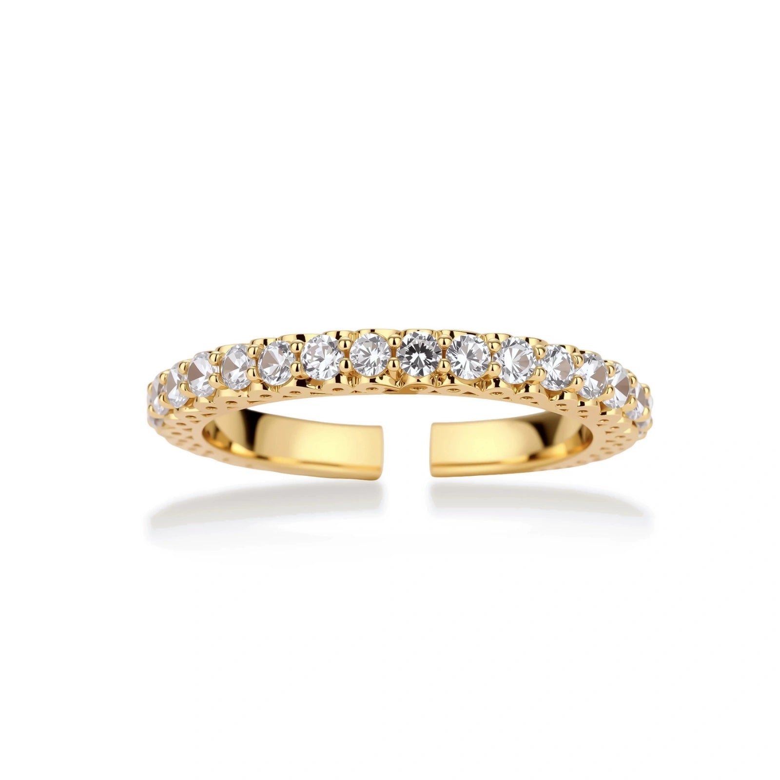 Close-up of adjustable gold-plated ring with continuous row of round zirconia stones on neutral background.