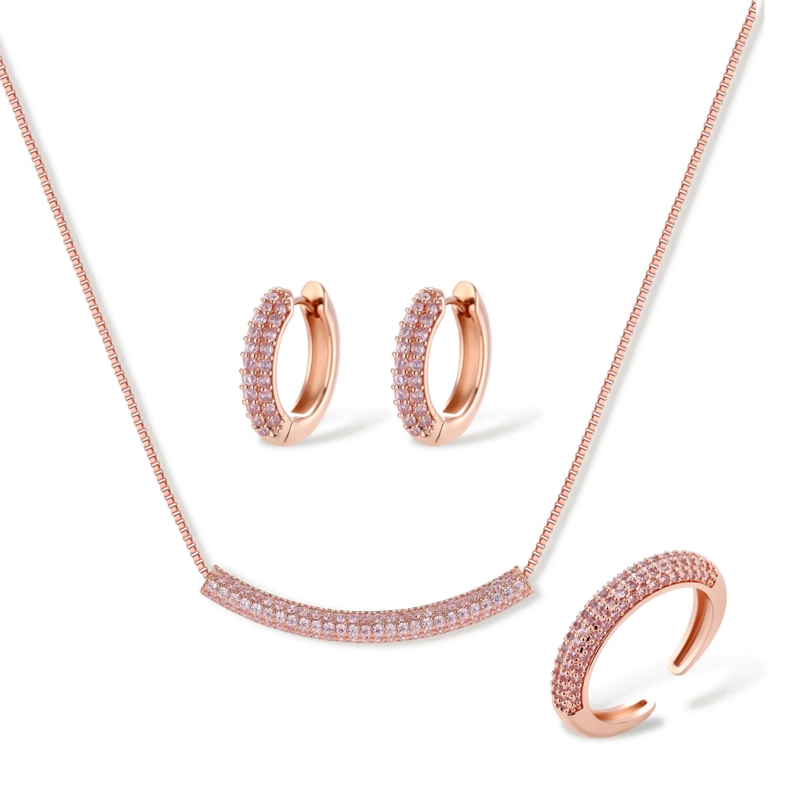 Rose gold pavé zirconia bar necklace, hoop earrings, and open ring set with pink stones on cream background.