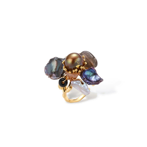 Adjustable gold-plated ring featuring clustered dark baroque pearls in organic arrangement on white background.