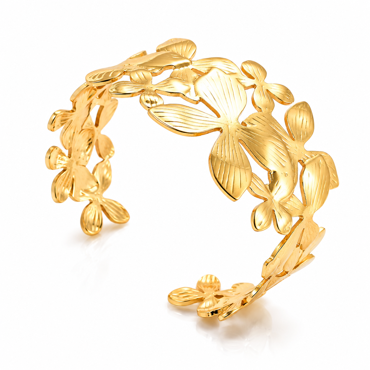 Flora sculpted gold-tone floral cuff bracelet on a clean product background