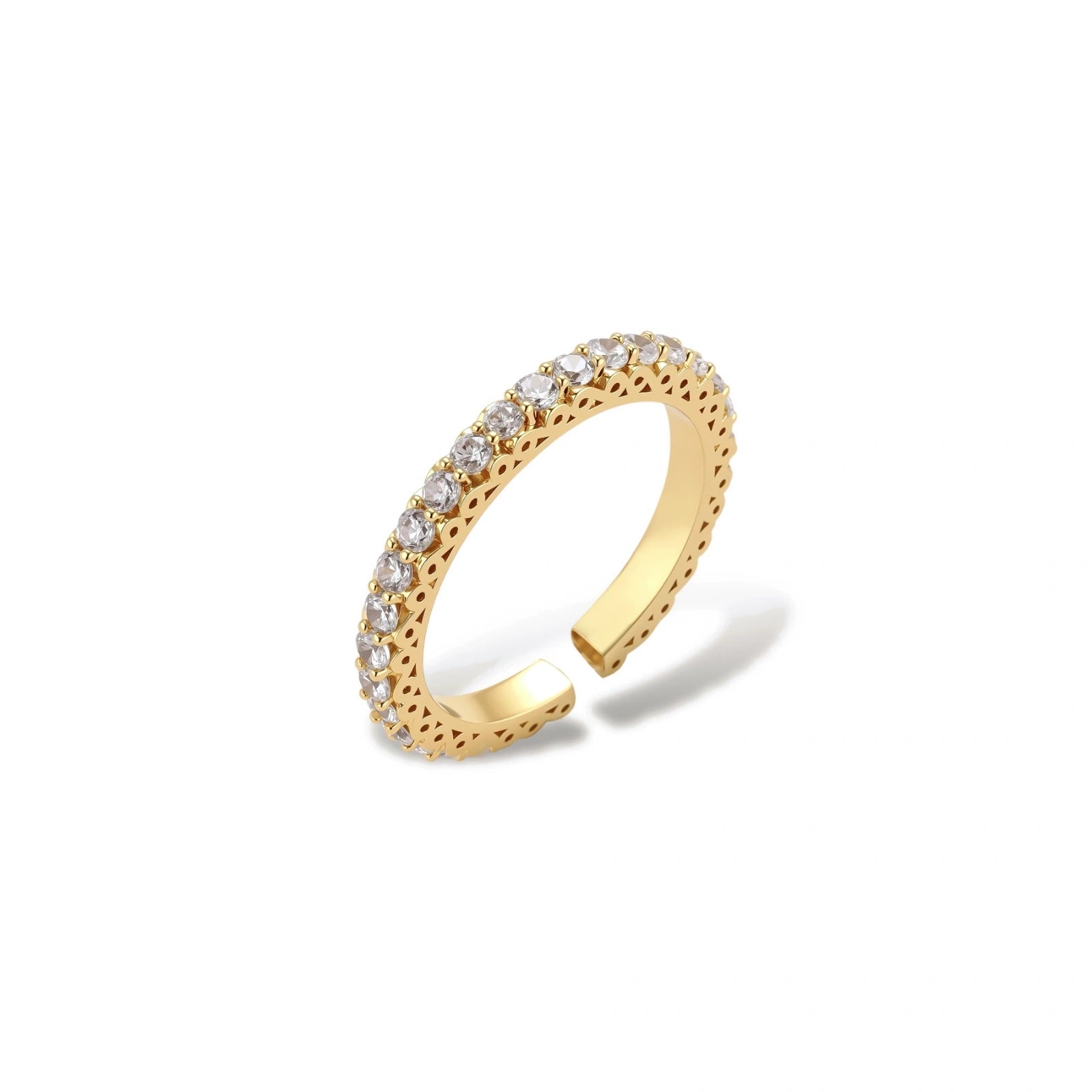 Close-up of adjustable gold-plated ring with continuous row of round zirconia stones on neutral background.