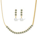 Gold-plated jewelry set with green cubic zirconia floral motifs, featuring matching necklace and pearl drop earrings