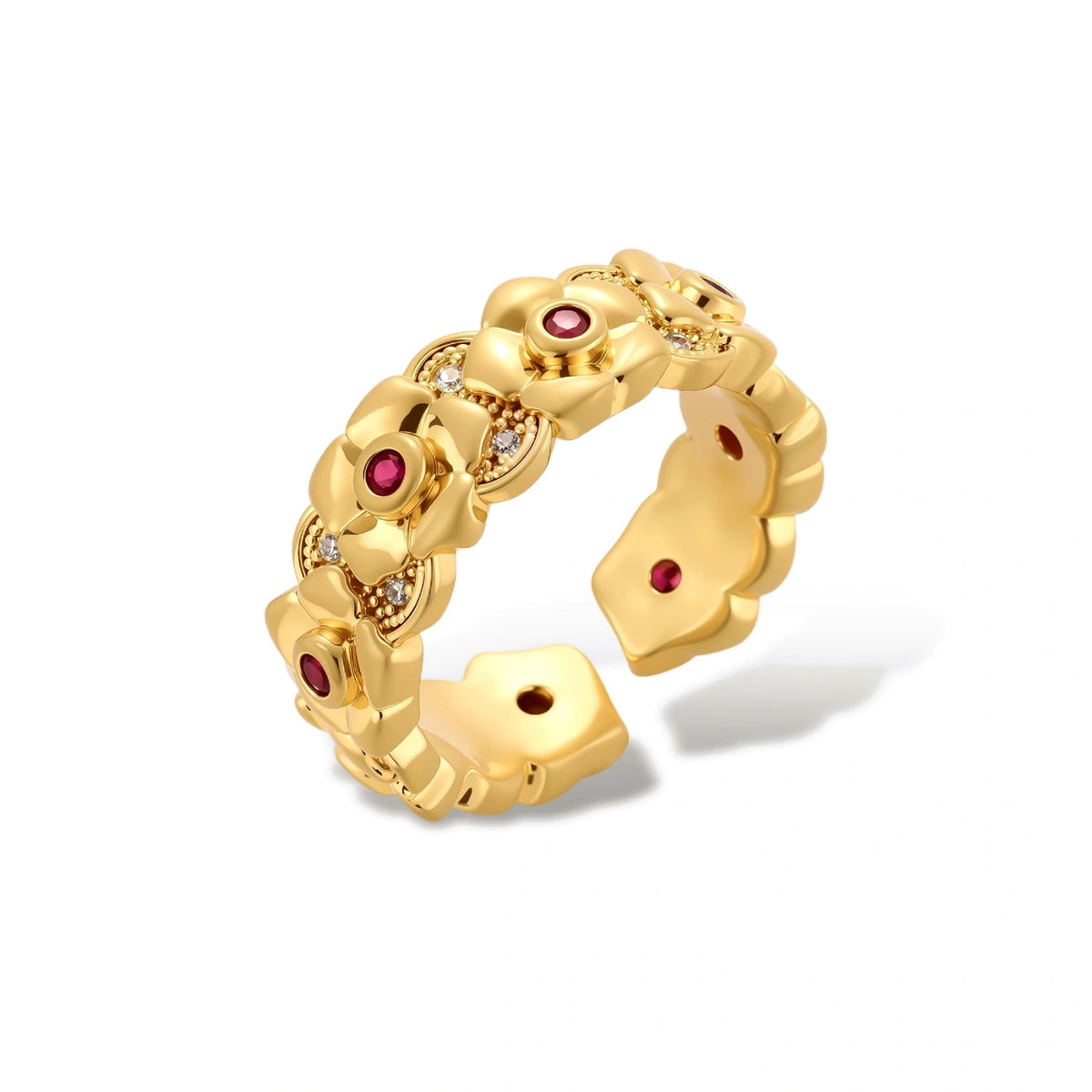 Adjustable gold-plated ring with burgundy zirconia centered flowers and crystal accents on cream background.