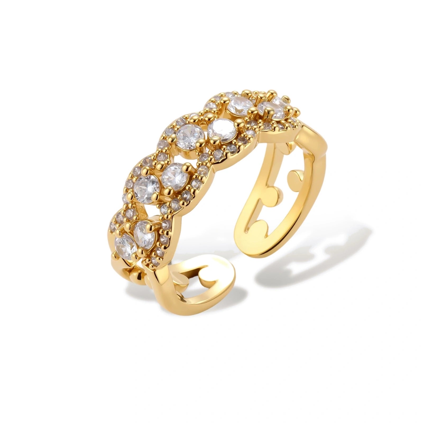 Adjustable gold-plated ring with multiple crystal clusters in intricate chain design on cream background.