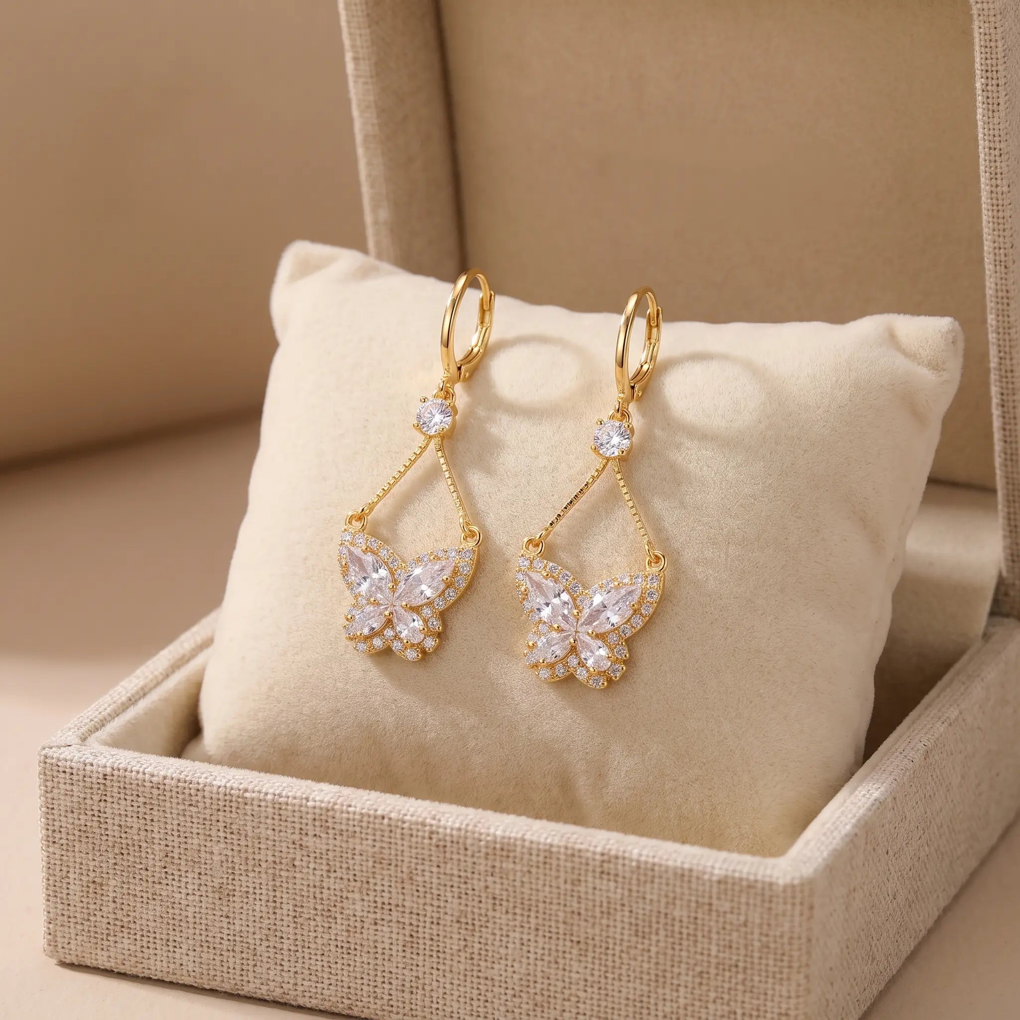 Zircon Butterfly Drop Earrings — pavé cubic zirconia butterfly with teardrop drop